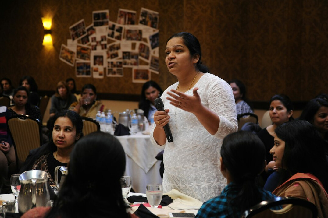 person speaking in front of audience