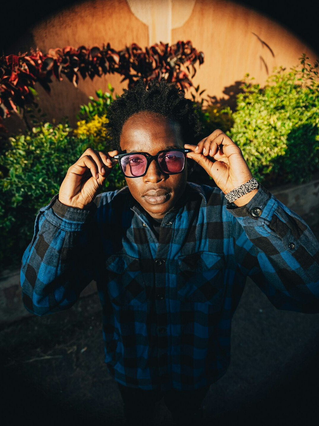 Portrait of a smiling Brazilian man with glasses