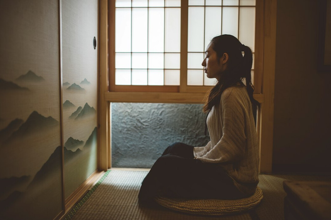 person meditating for focus